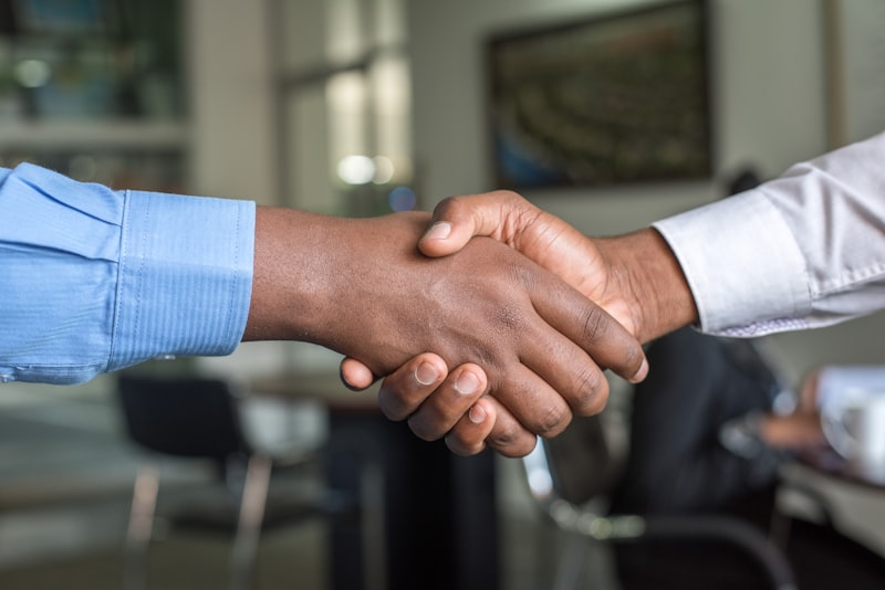 Professional handshake between recruiter and candidate